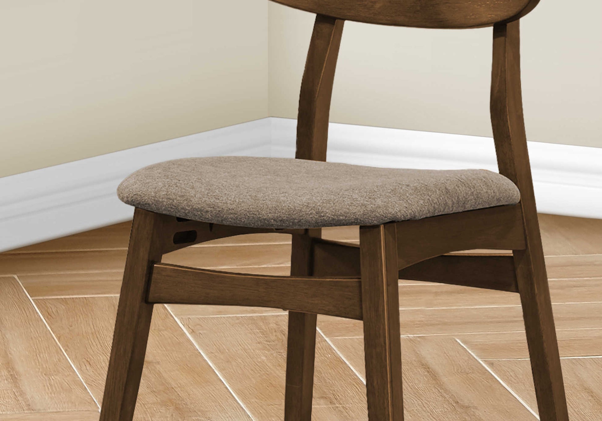 Set of 2 mid-century walnut dining chairs with beige upholstered seats.