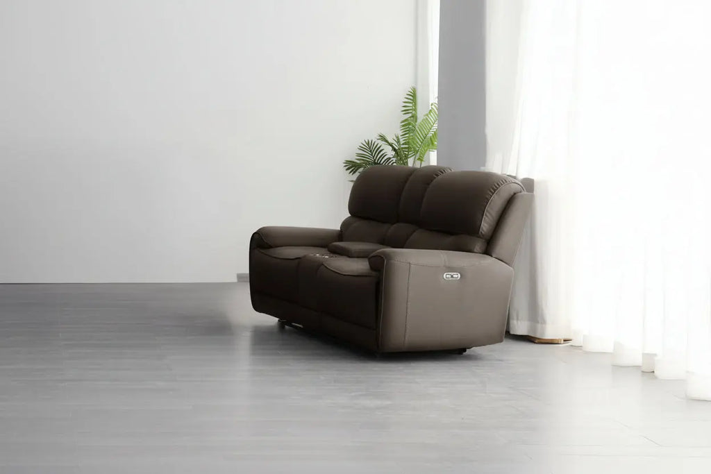 Modern reclining sofa by Meuble Divino, featuring plush cushions and a sleek design for comfortable relaxation.