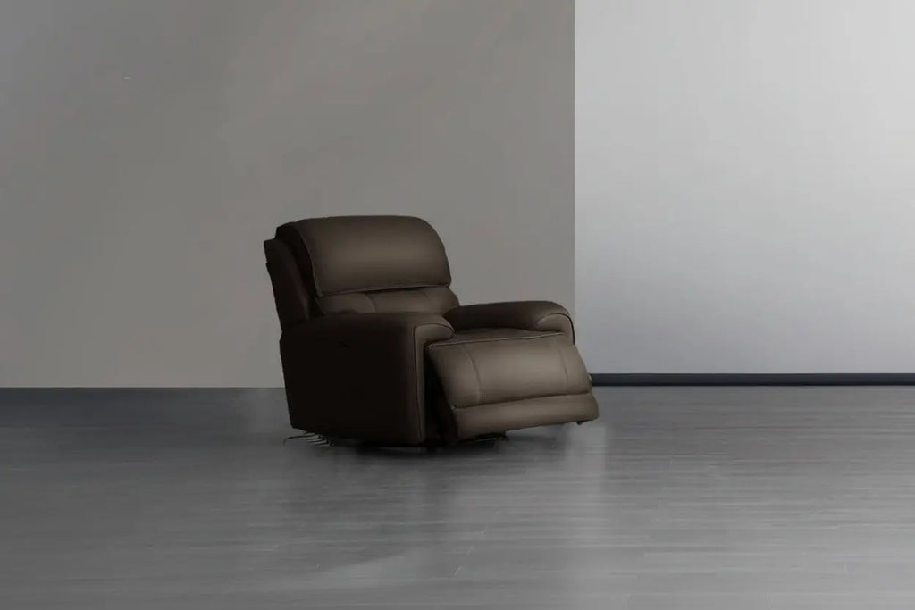 Modern reclining sofa by Meuble Divino with plush fabric and adjustable headrests, shown in a stylish living room setting.