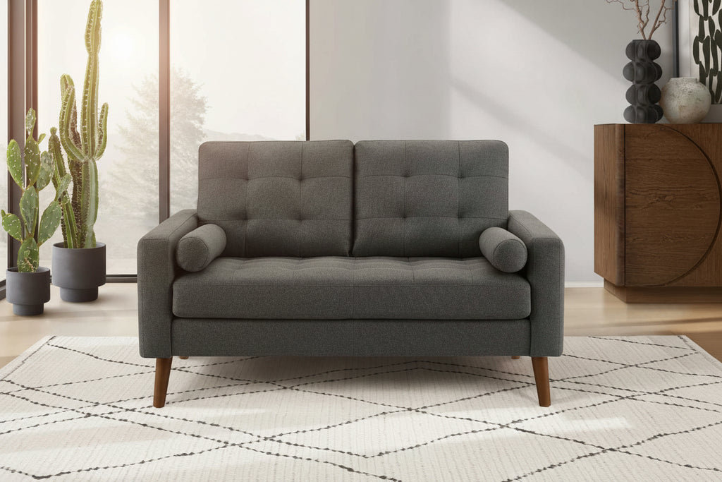 Elegant Elysian sofa by Meuble Divino with plush fabric and modern design, shown in a stylish living room setting.