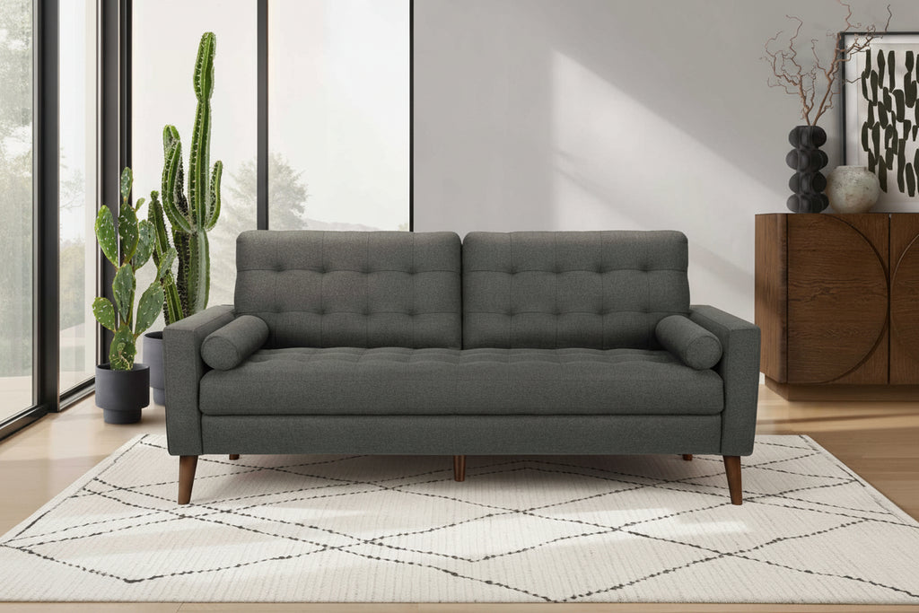 Elysian sofa by Meuble Divino, featuring a modern design with plush cushions and sleek fabric upholstery.