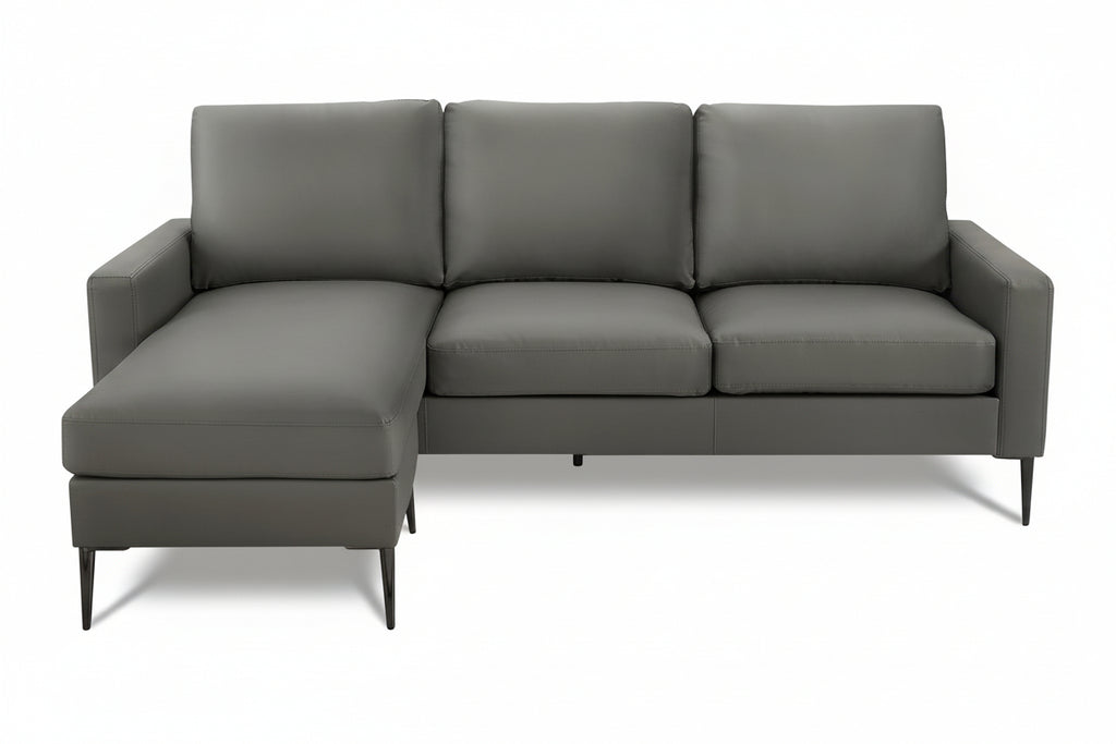 Reversible Monroe sofa by Meuble Divino with plush cushions and modern design, shown in a contemporary living room setting.