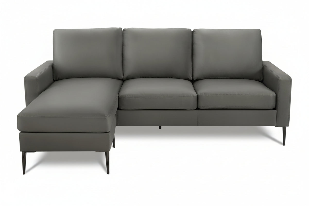 Reversible Monroe sofa by Meuble Divino with plush cushions and modern design, shown in a contemporary living room setting.