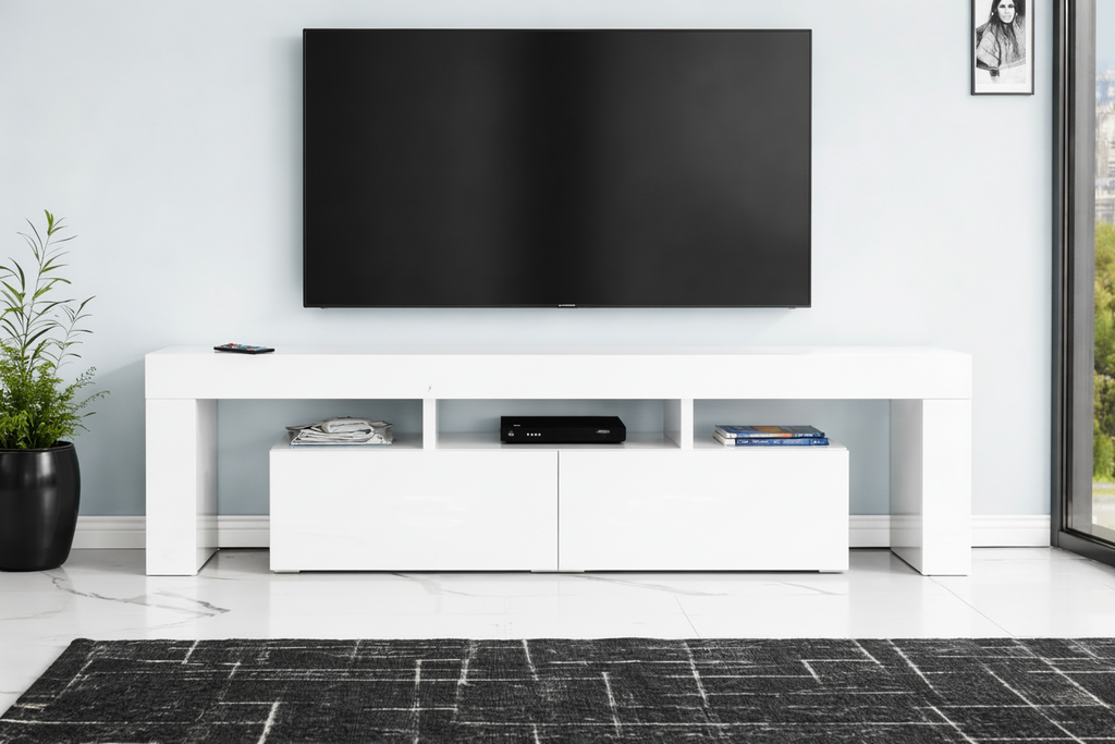 White contemporary TV stand by MTL Meubles et Matelas with sleek modern design and open shelving for media devices.