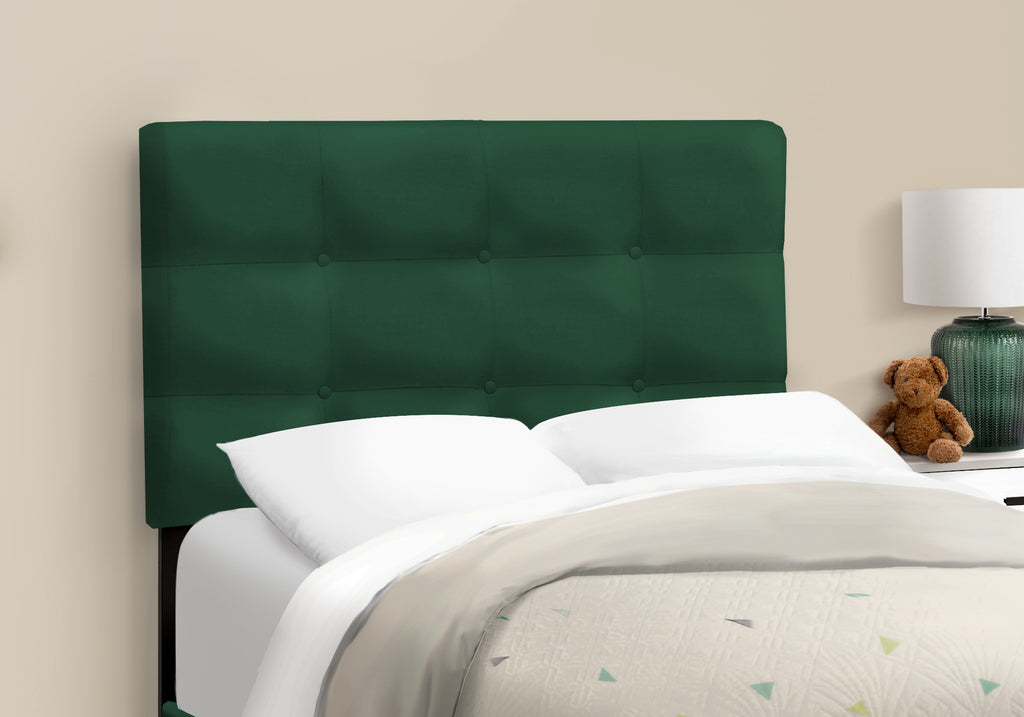 Green velvet single bed by Meuble Divino with a modern design and plush upholstered headboard.