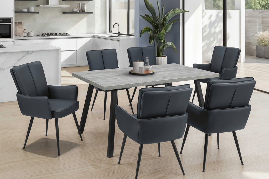 Grey dining table with metal frame by Meuble Divino, showcasing a modern, sleek dining room setup with sturdy construction.