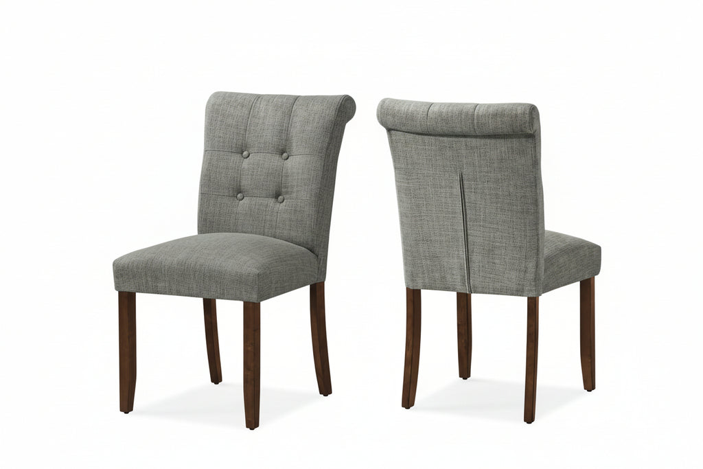 Set of two Meuble Divino dining chairs with cushioned upholstered seats and backrests, showcasing a stylish and comfortable design.