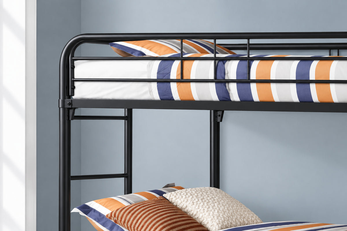 Twin over twin metal bunk bed by Meuble Divino with sturdy frame and ladder, designed for space-saving sleeping arrangements.