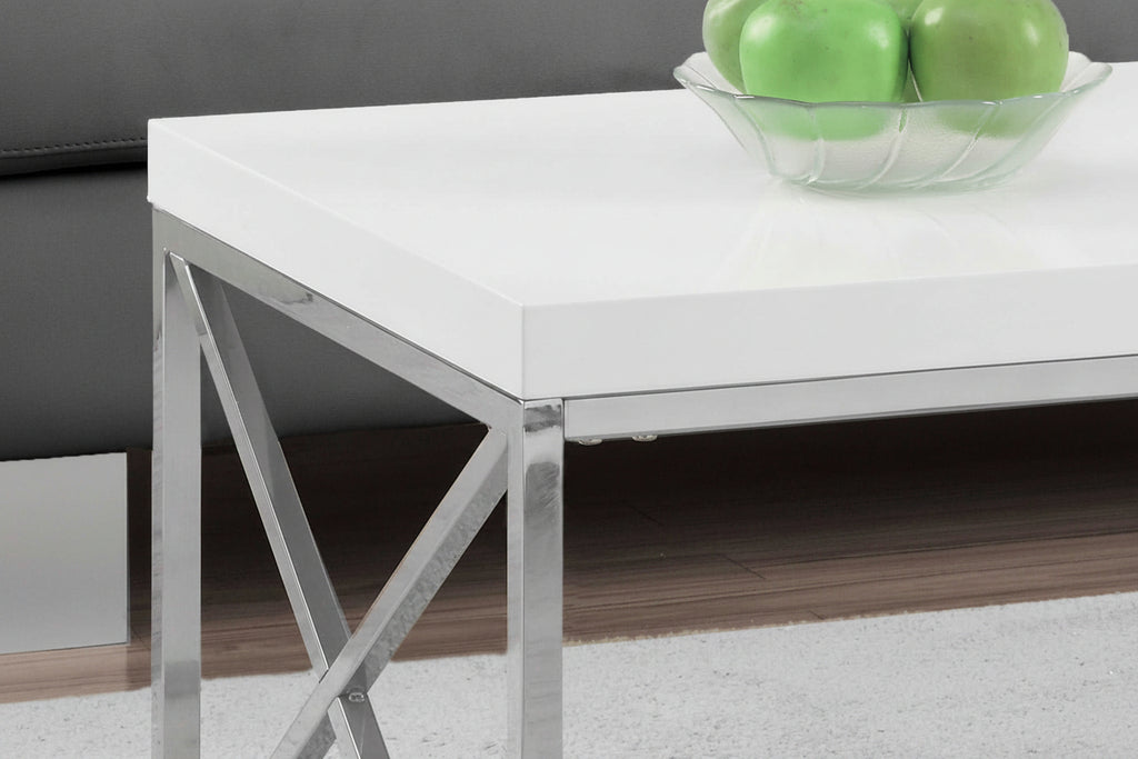 Table basse blanc brillant avec piètement en X chromé