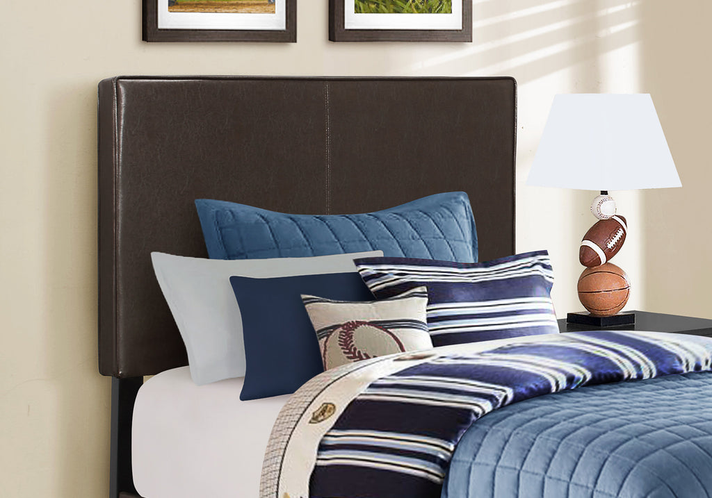 Single bed with PU leather upholstery by Meuble Divino, featuring a sleek, modern design and sturdy wooden frame.