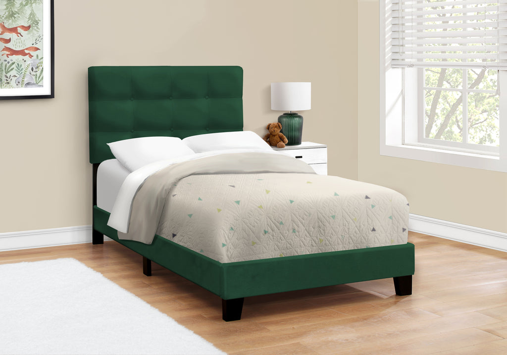 Green velvet single bed by Meuble Divino with a modern frame and plush upholstery, ideal for a stylish bedroom.