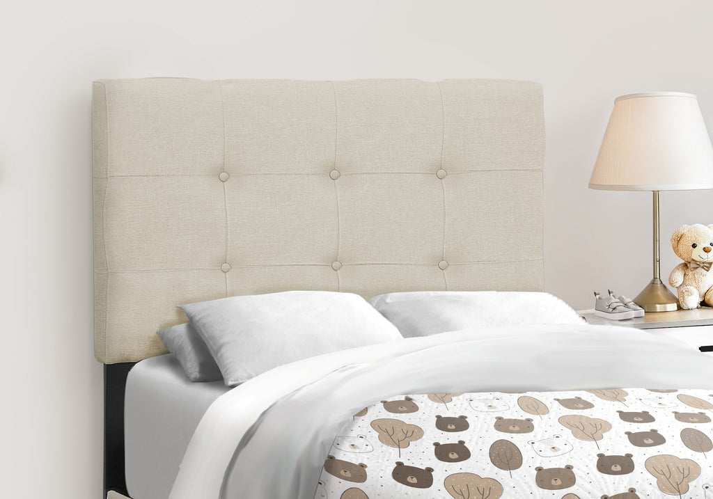 Beige linen single bed by Meuble Divino with a modern frame and clean design, perfect for a cozy bedroom setting.