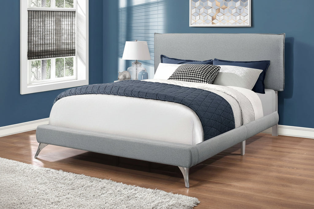 Elegant Elara Bed by Meuble Divino featuring a modern design with a wooden frame and upholstered headboard.