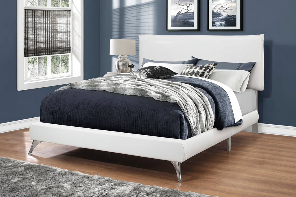 Elegant Elara Bed by Meuble Divino with a modern wooden frame and plush upholstered headboard, displayed in a contemporary bedroom setting.