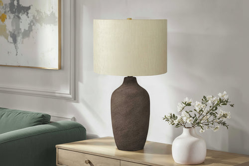 Grey ceramic table lamp with linen shade, 27-inch height, designed by Meuble Divino, perfect for living room or bedroom decor.