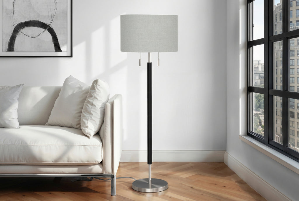 Avery Dual-Light Modern Floor Lamp by Meuble Divino with sleek design and dual light sources, standing on a contemporary living room floor.