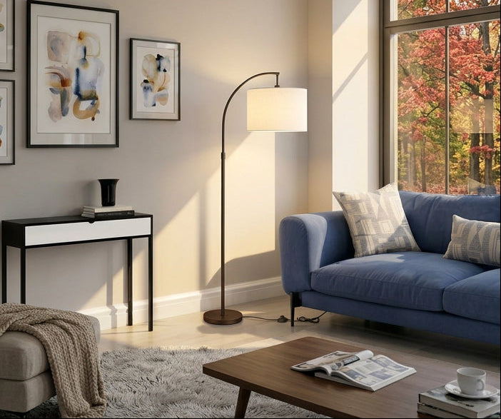 Modern Aria Arc Floor Lamp by Meuble Divino with sleek metal finish and curved design, perfect for contemporary living spaces.