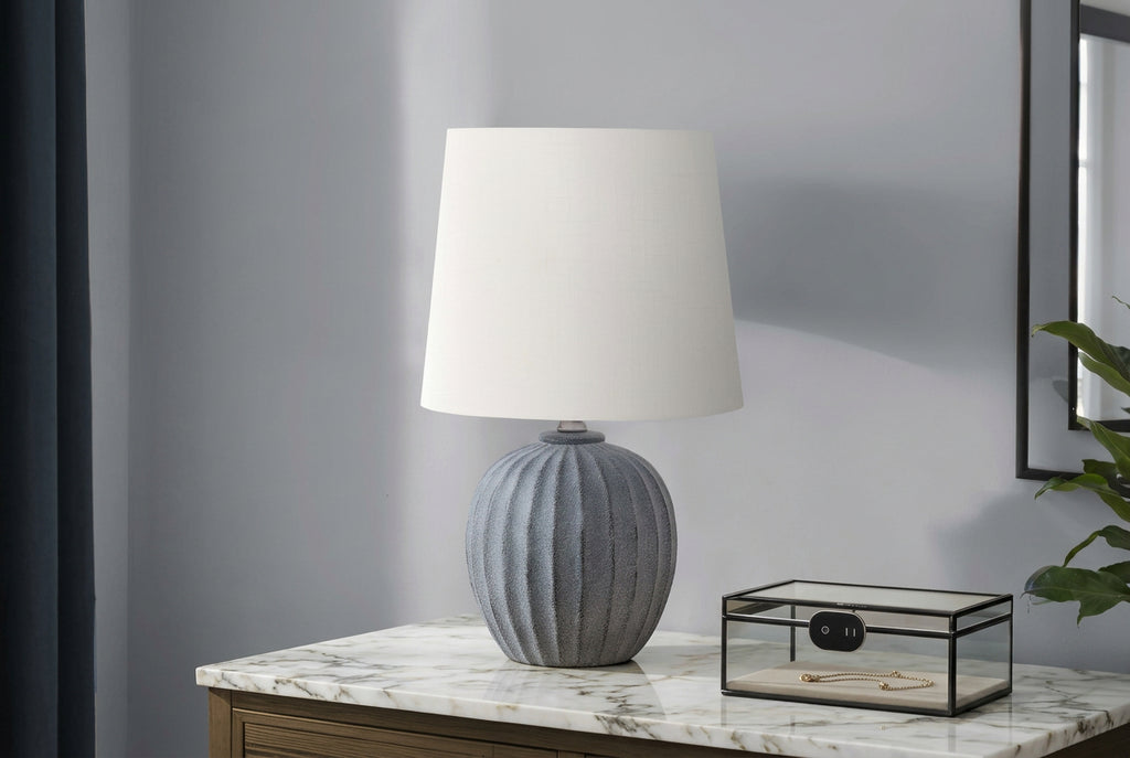 Fluted resin table lamp from Meuble Divino, showcasing a stylish, textured design perfect for home accessories.