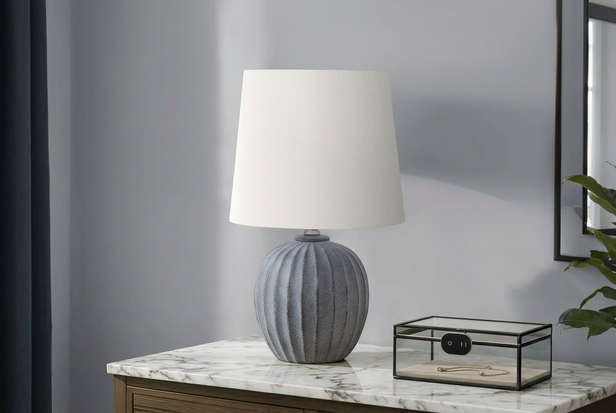 Fluted resin table lamp from Meuble Divino, showcasing a stylish, textured design perfect for home accessories.